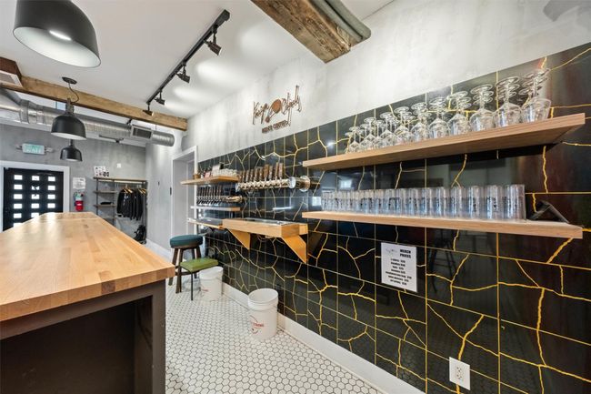 Kitchen featuring open shelves and track lighting | Image 10