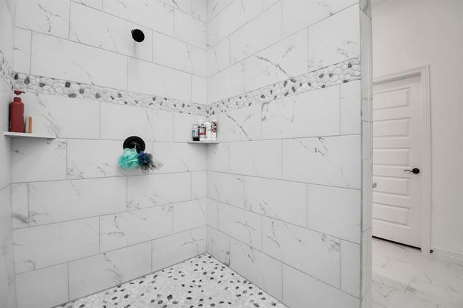 Open shower area of primary bathroom | Image 35