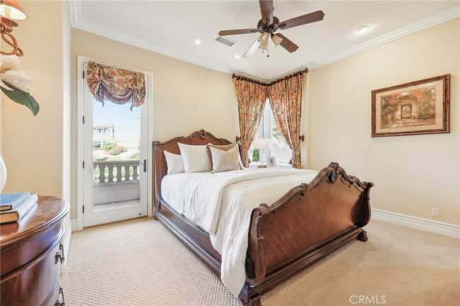 Another Bedroom has a front balcony. | Image 54