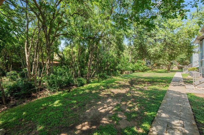 View of grassy yard featuring​​‌​​​​‌​​‌‌​‌‌​​​‌‌​​‌‌​‌​​​​​‌ stairway | Image 18