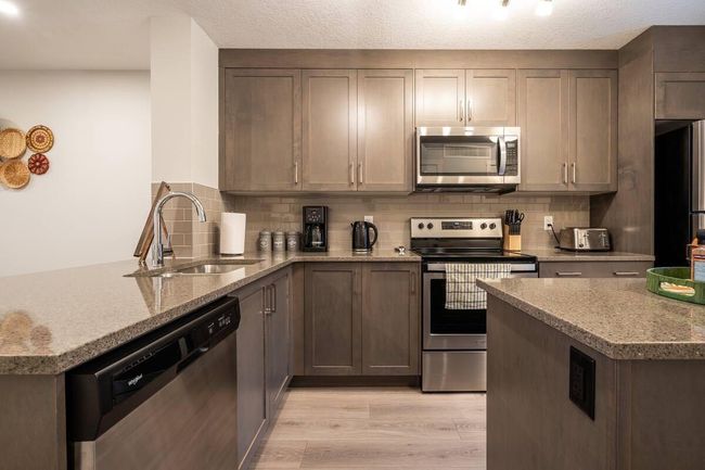 118 - 19500 37 Street, Home with 2 bedrooms, 2 bathrooms and 1 parking in Calgary AB | Image 2