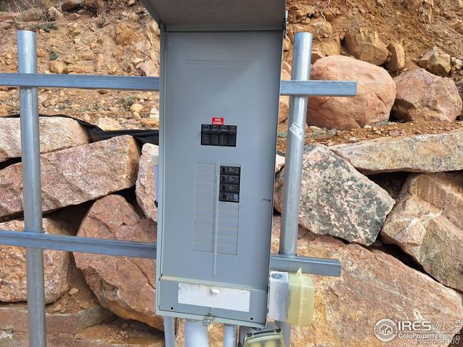 200A Electric Service Panel located on upper driveway | Image 32