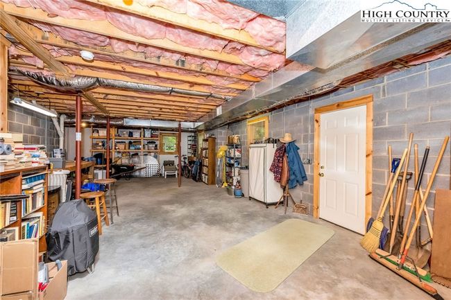 This is a walk-out basement. The 3 windows allow in the natural light. | Image 25