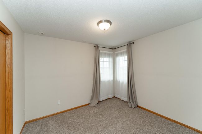 Second bedroom with closet. | Image 12