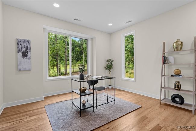 Office featuring healthy amount of natural light, light wood-style floors, and recessed lighting | Image 25