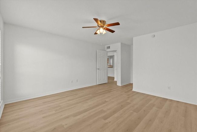 Alternate angle of primary bedroom showing generous light | Image 16