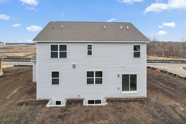 Full (egress) basement allows you to walk out to your backyard from the main floor. Model photo. Options and colors will vary. | Image 37