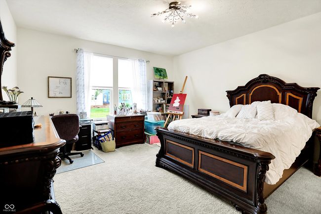 Primary Bedroom has ample space and great light. | Image 13