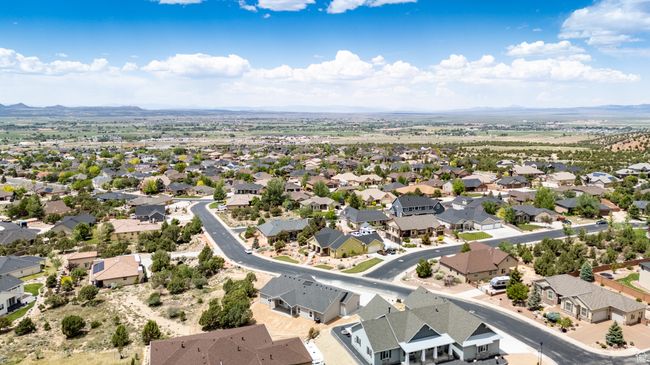 Aerial view of residential area with a mountainous background | Image 63