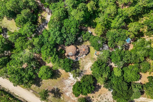 Overview of rural landscape featuring a heavily wooded area and property parcel outlined | Image 20