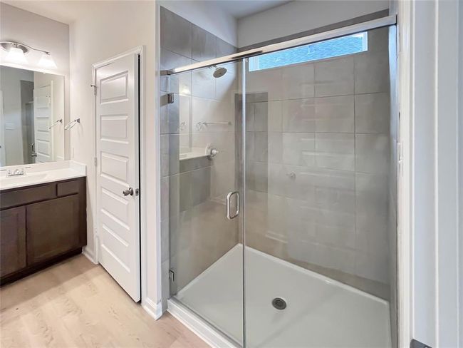 The Cardinal II- Primary Bathroom with Large Walk-in Shower. Home under construction. Sample floor plan photo used for illustrative purposes only. Upgrades, selections options, windows and colors may vary. | Image 10
