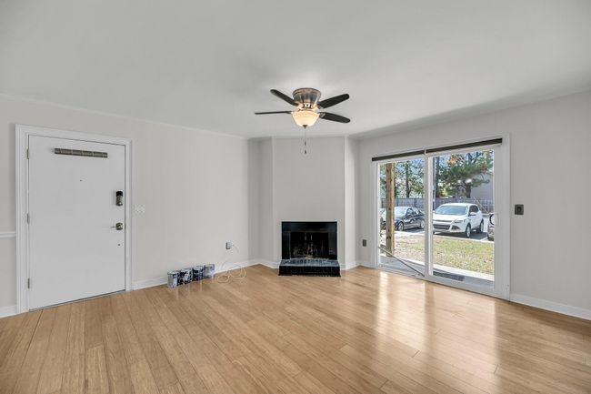 Living room w/ fireplace | Image 7