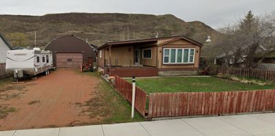 657 2 Ave, House detached with 3 bedrooms, 2 bathrooms and 4 parking in Drumheller AB | Image 1