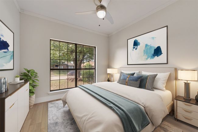Bedroom featuring crown molding, light wood-type flooring, and a ceiling fan | Image 13