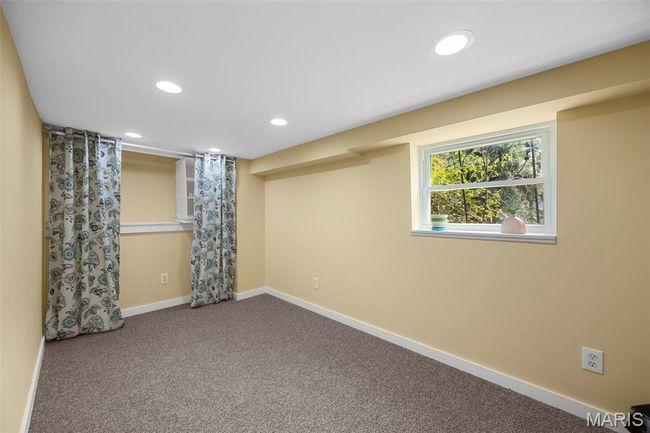 Carpeted spare room with recessed lighting and baseboards | Image 30