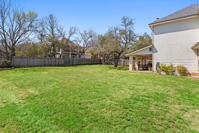 View of yard with a patio and a fenced backyard | Image 39