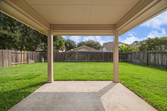 Step outside to endless possibilities! Imagine a future pool and outdoor grill offering family and friends the spacious covered patio from which to enjoy all. | Image 24