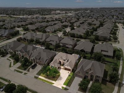 This home sits on a large lot with ample yard space in front and the back, lush landscaping and a well-maintained yard. Plenty of space to accommodate guests, parking and situated on a quiet cul-de-sac street in the Cinco Ranch Northwest community. | Image 2