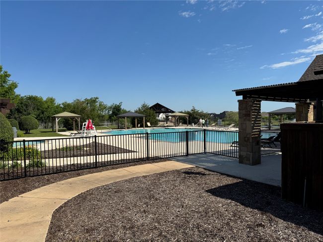 Community pool featuring a gazebo and fence | Image 37