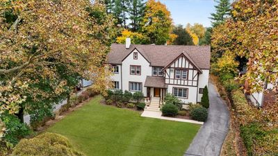 Tudor home featuring a front yard | Image 1