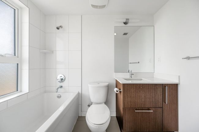 Full bath featuring vanity and shower / washtub combination | Image 18