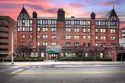 View of outdoor building at dusk | Image 1