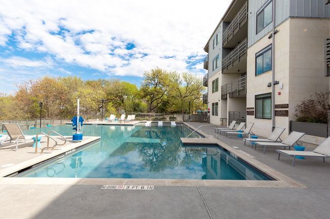Community pool with a patio area | Image 4