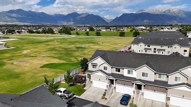 Aerial view of residential area with mountains | Image 36