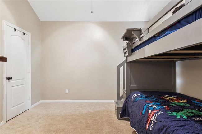 The second bedroom is spacious and offers new carpet and fresh paint. | Image 17