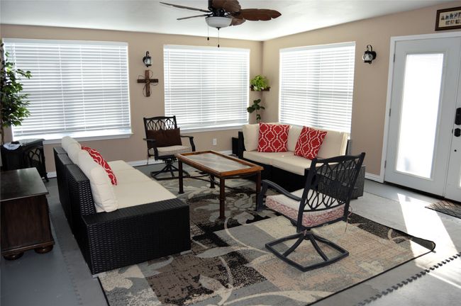 Exit to the back patio for barbecues. | Image 11