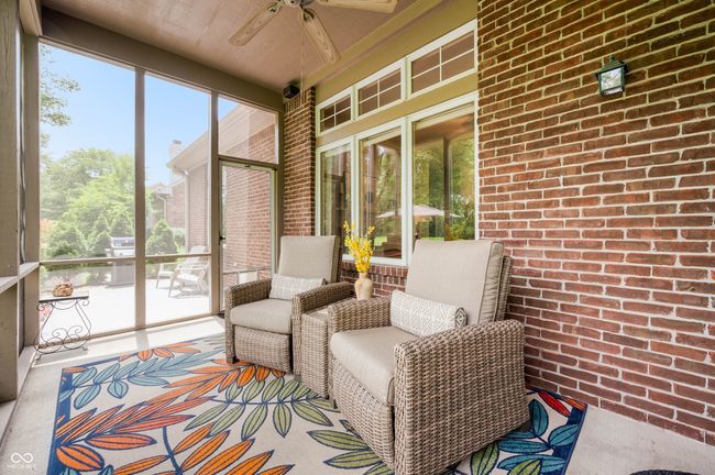 Sreened-in Porch opens up to the Patio and Privage Backyard. | Image 26