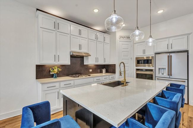 Another view of the kitchen. | Image 15