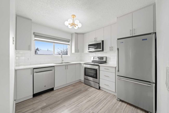 7 Whitmire Road Ne, Home with 4 bedrooms, 2 bathrooms and 2 parking in Calgary AB | Image 9