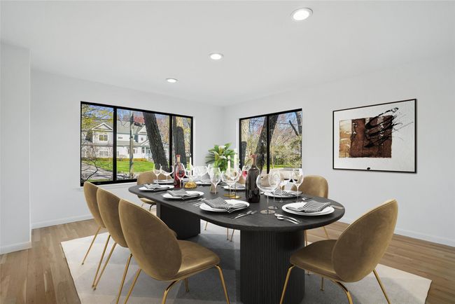 Beautifully proportioned dining room will easily accommodate grand scale entertaining. | Image 11