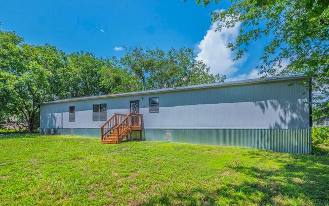 Manufactured / mobile home with a front yard | Image 18