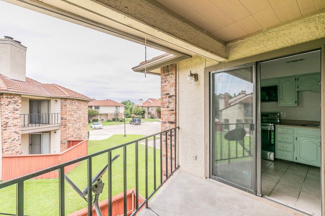 Balcony featuring a residential view | Image 26