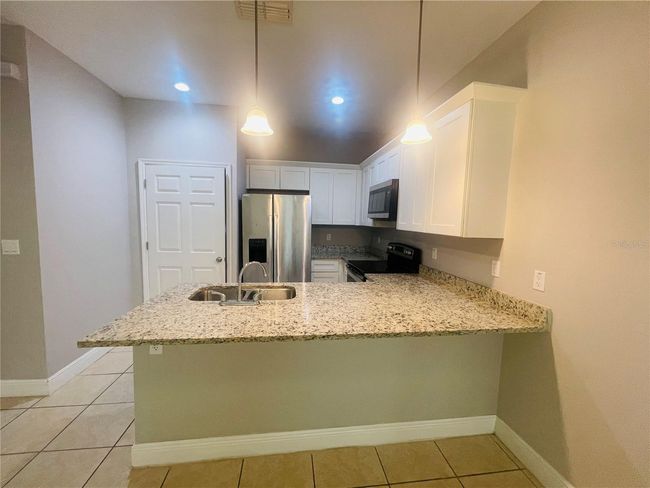 1589 Cumin Dr, Home with 2 bedrooms, 2 bathrooms and null parking in POINCIANA FL | Image 9
