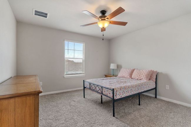 One of three guest bedrooms on second floor. | Image 24