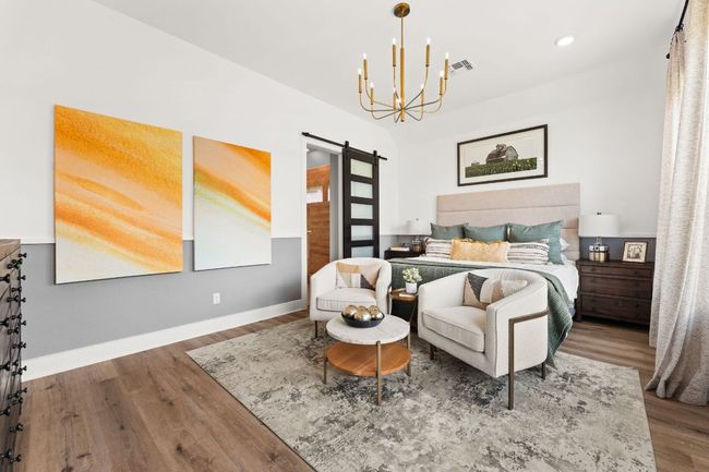 The spacious primary suite is tucked away for ultimate privacy and tranquility. | Image 9