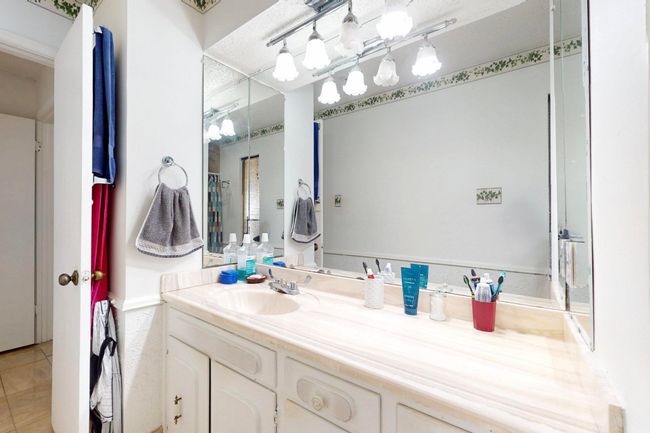 Bathroom with tile patterned flooring and vanity | Image 20