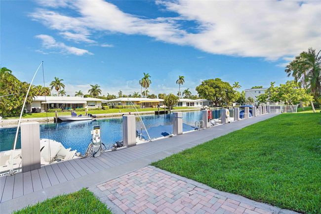 JUST LISTED, A BEACH & BOATERS LOVERS DREAM!!.. PRIVATE DEEDED BEACH ACCESS ACROSS THE STREET AND NEW BOAT DOCK TO LIVE THE LIFESYTLE OF LAUDERDALE BY THE SEA. THIS HIGHLY DEMANDED 2 BEDROOM 2 BATH UNIT FEATURES THE PERFECT LOCATION IN A WELL MANAGED AND FINANCIALLY SOUND COMPLEX WITH ALL CERTIFICATIONS COMPLETED. THE UNIT OFFERS ALOT OF UPDATES, HIGH IMPACT DOORS, WINDOWS, NEWER AC AND HOT WATER HEATER AS WELL AS A NICE SUNROOM OFFERING PLUSH BOTANICAL GARDEN & POOL VIEWS. | Image 15
