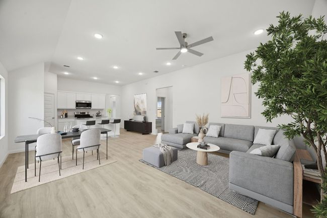 Living room featuring light wood-type flooring, a ceiling fan, and recessed lighting | Image 13