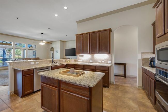 The freshly painted kitchen shows the under-counter lighting, the Bosch dishwasher was replaced June 2024 | Image 12