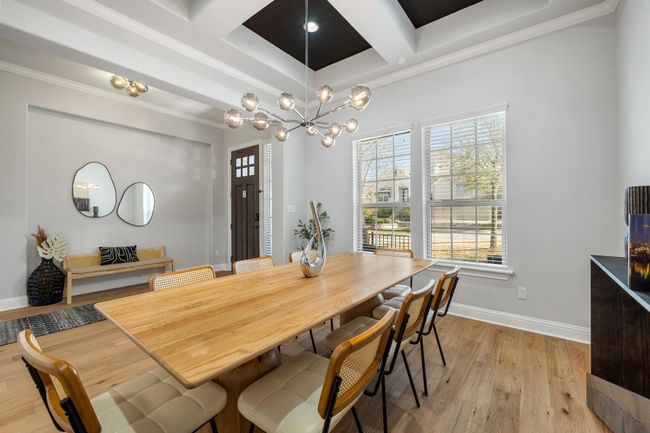 The stylish Sputnik chandelier is sure to be a conversation piece along with the five inch luxury engineered wood floors and coffered ceilings. | Image 8