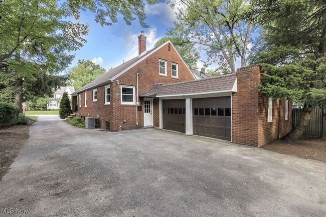 View of property exterior featuring central AC | Image 47