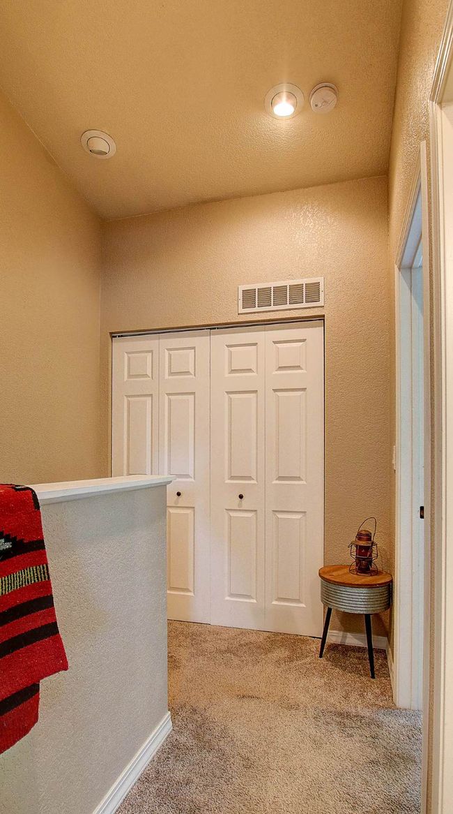 Hall featuring carpet | Image 18