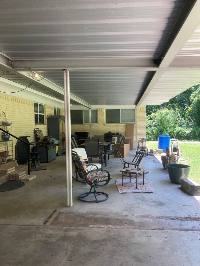 View of patio from 2 car carport | Image 8