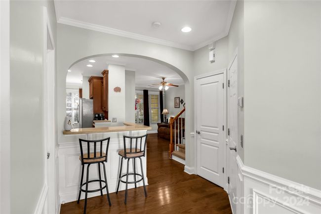 Entry way with views into the kitchen and breakfast bar. | Image 4