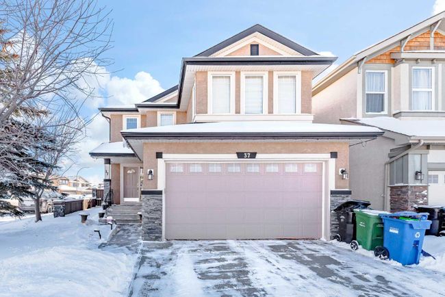 37 Everwillow Park Sw, Home with 4 bedrooms, 3 bathrooms and 4 parking in Calgary AB | Image 1