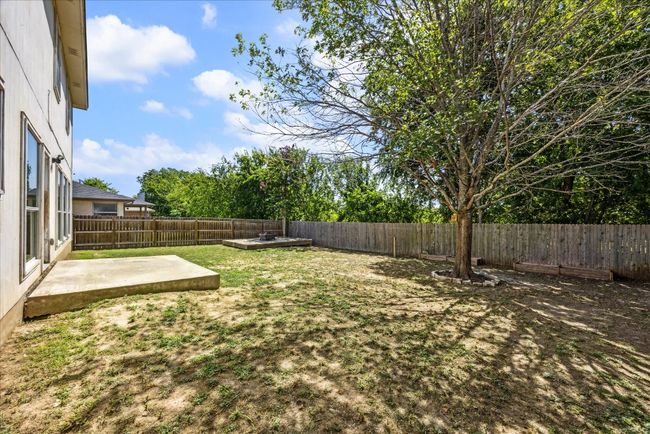 View of yard with a patio area and a fenced backyard | Image 29